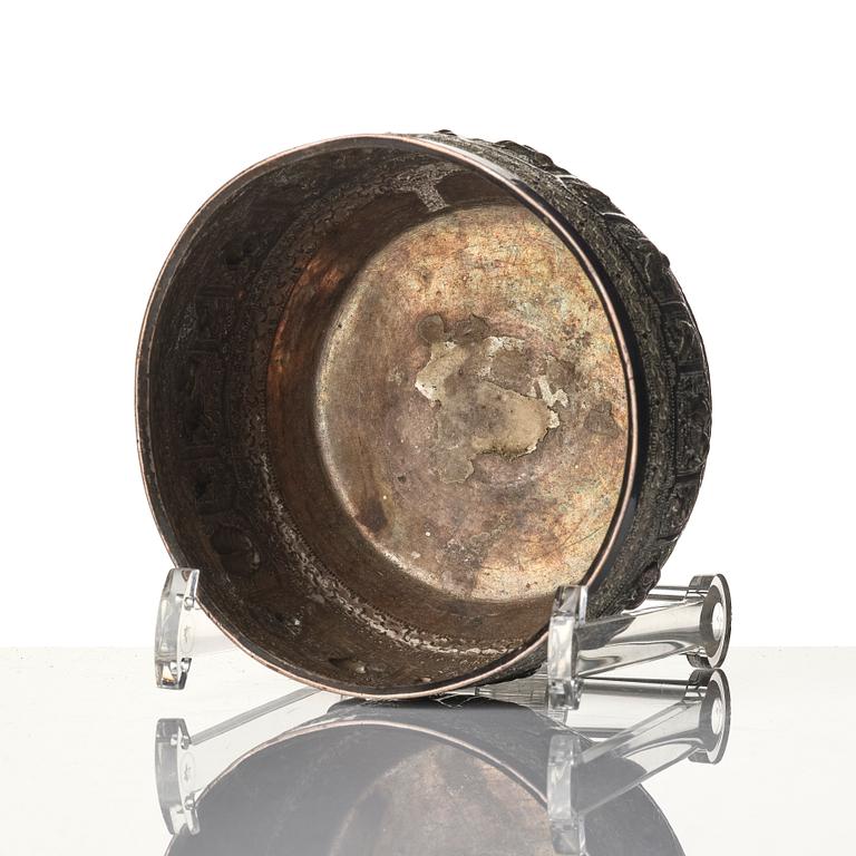 A Chinese brushpot, Qing dynasty, circa 1900. An archaistic bronze ewer and a silvered South East Asian bowl with stand.