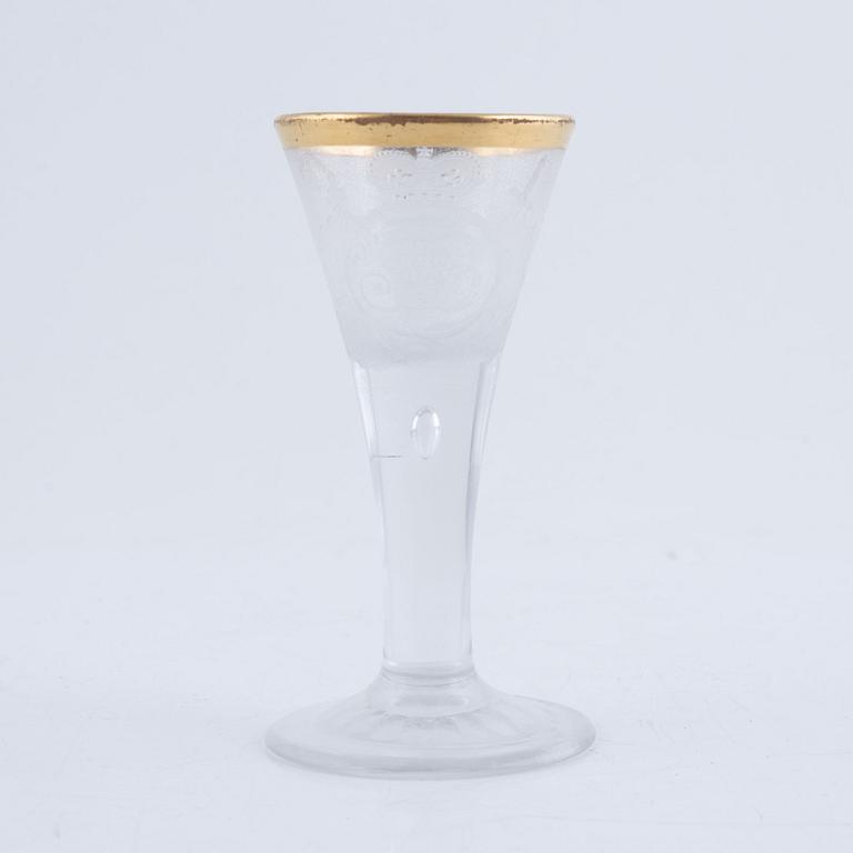 A presumably German engraved and gilt rococo glass, mid 18th century.