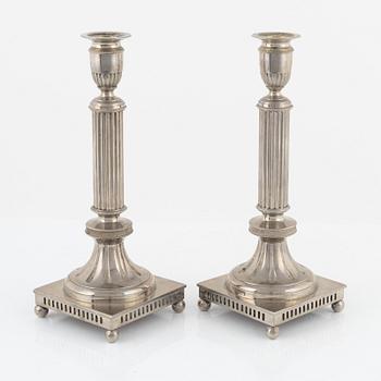 Carl Keijser & Co, a pair of Gustavian style candlesticks, first half of the 20th Century.