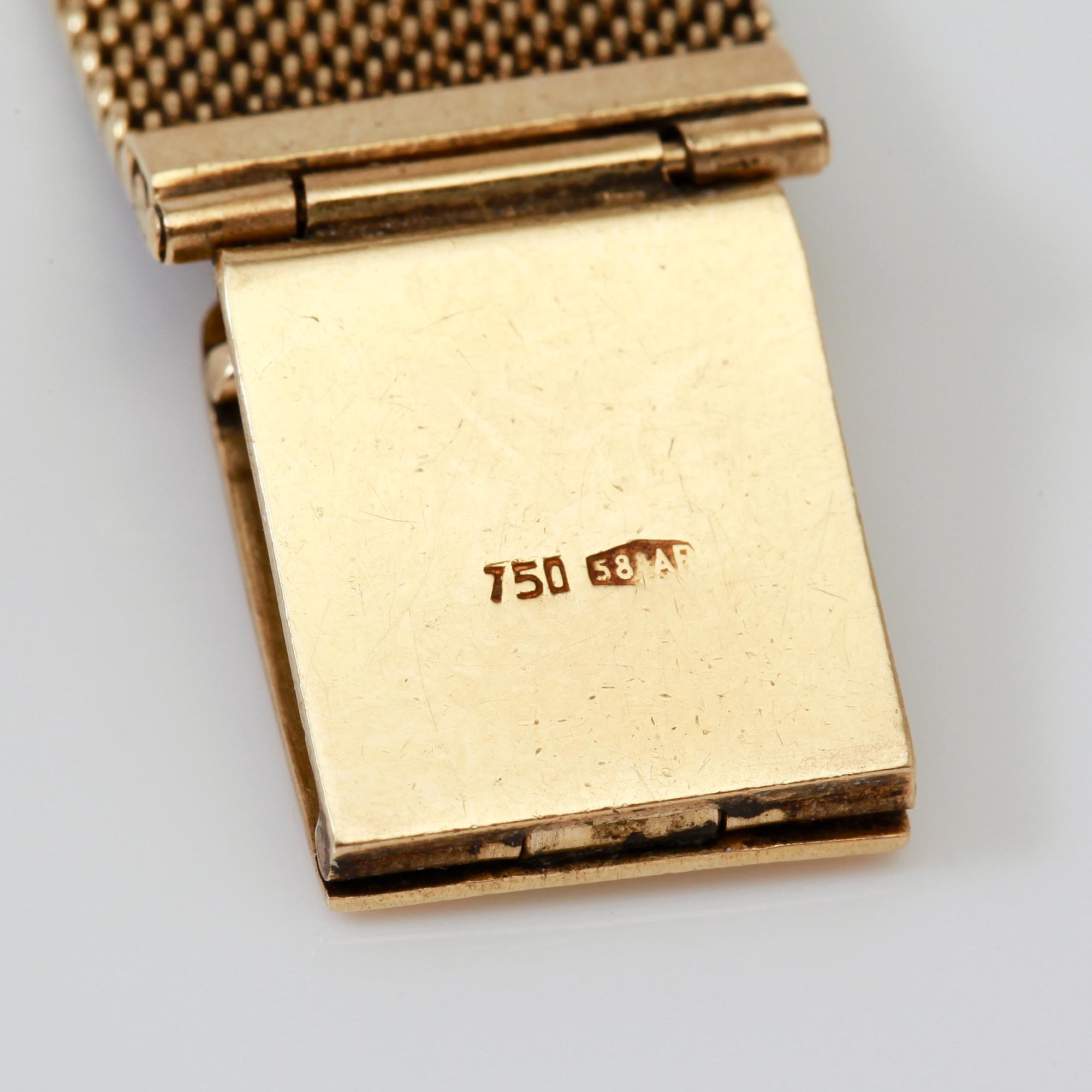 ARMBANDSUR, 18K guld, Omega. Total vikt inklusive urhus ca 65 g.