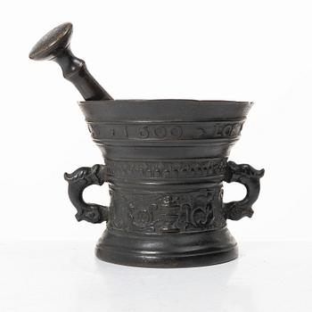Mortar and pestle, dated 1600. Baroque.