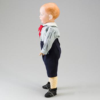 A bisque head character doll marked 226, probably France, 1910s.