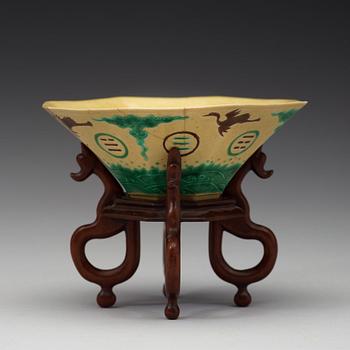 A yellow, green and aubergine glazed bisquit bowl, Qing dynasty, 18th Century.