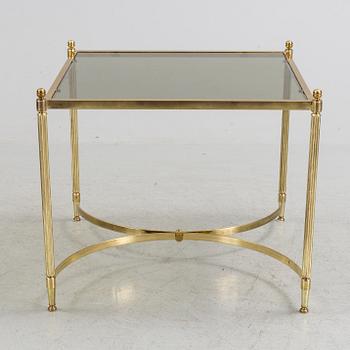 A brass and glass coffee table from the second half of the 20th century.