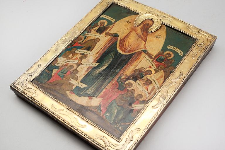 IKON, tempera på pannå, basma av förgyllt silver, St Petersburg, 1775.