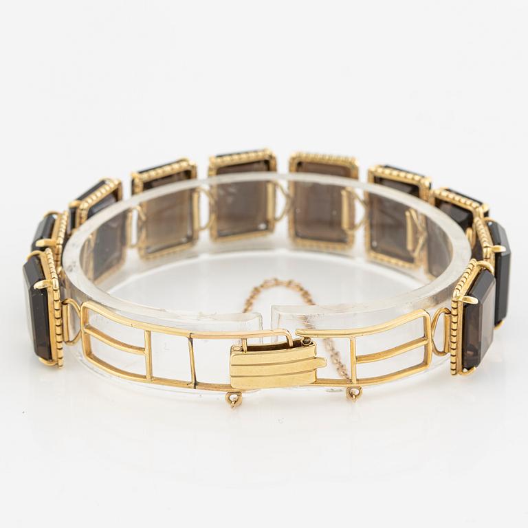 Bracelet, 14K gold with smoky quartz.