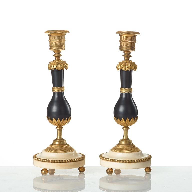 A pair of Louis XVI late 18th century candlesticks.