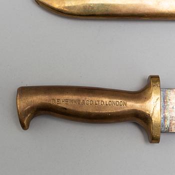 A brass diver's knife from C.E. Heinke & Co. Ltd., London, England.