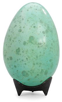 1312. A Hans Hedberg faience egg on an iron stand, Biot, France.