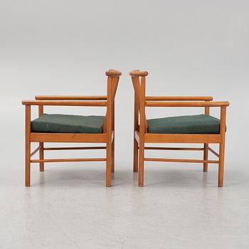 A pair of armchairs, mid 20th Century.