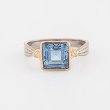 A synthetic blue spinel ring.