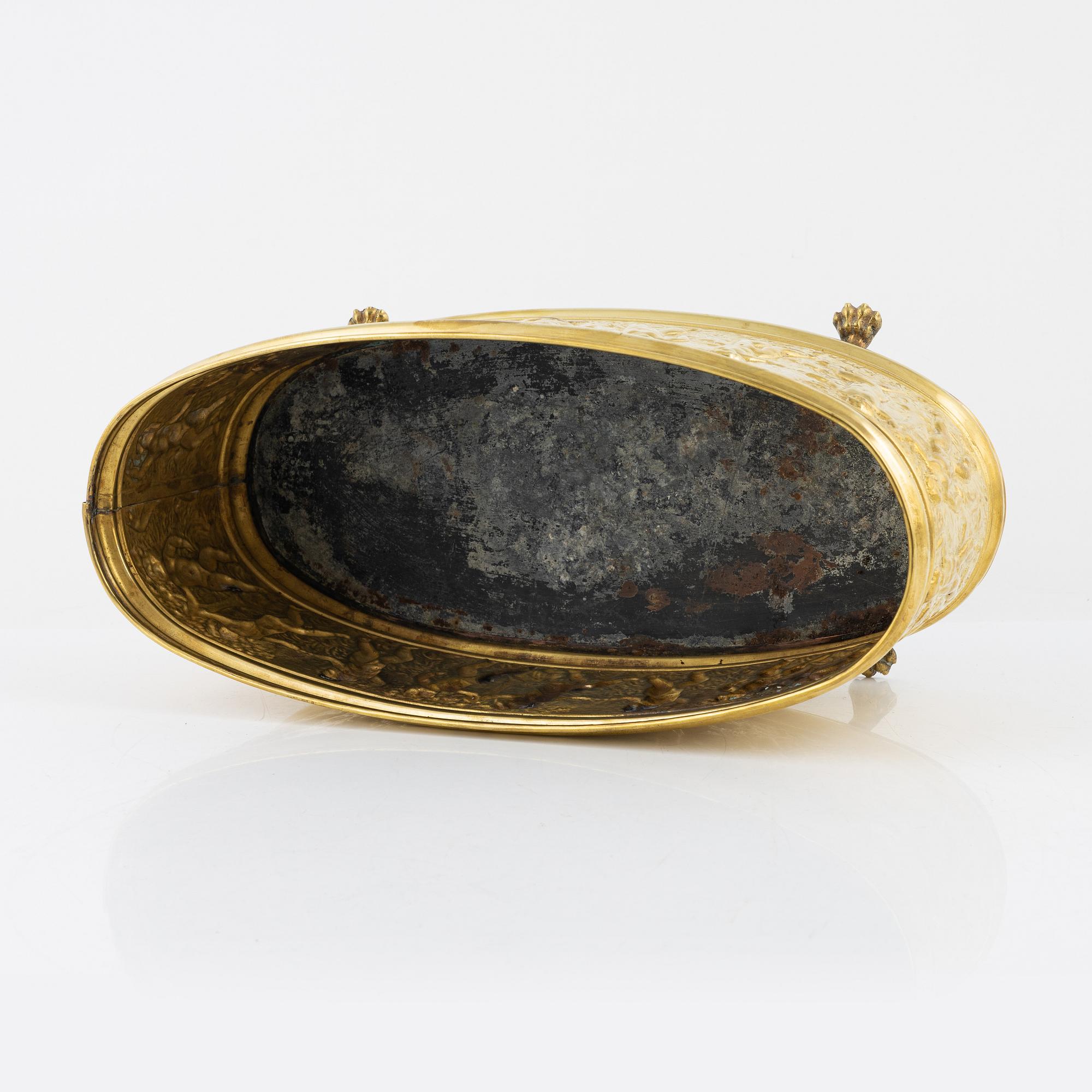 A brass jardiniere, circa 1900.