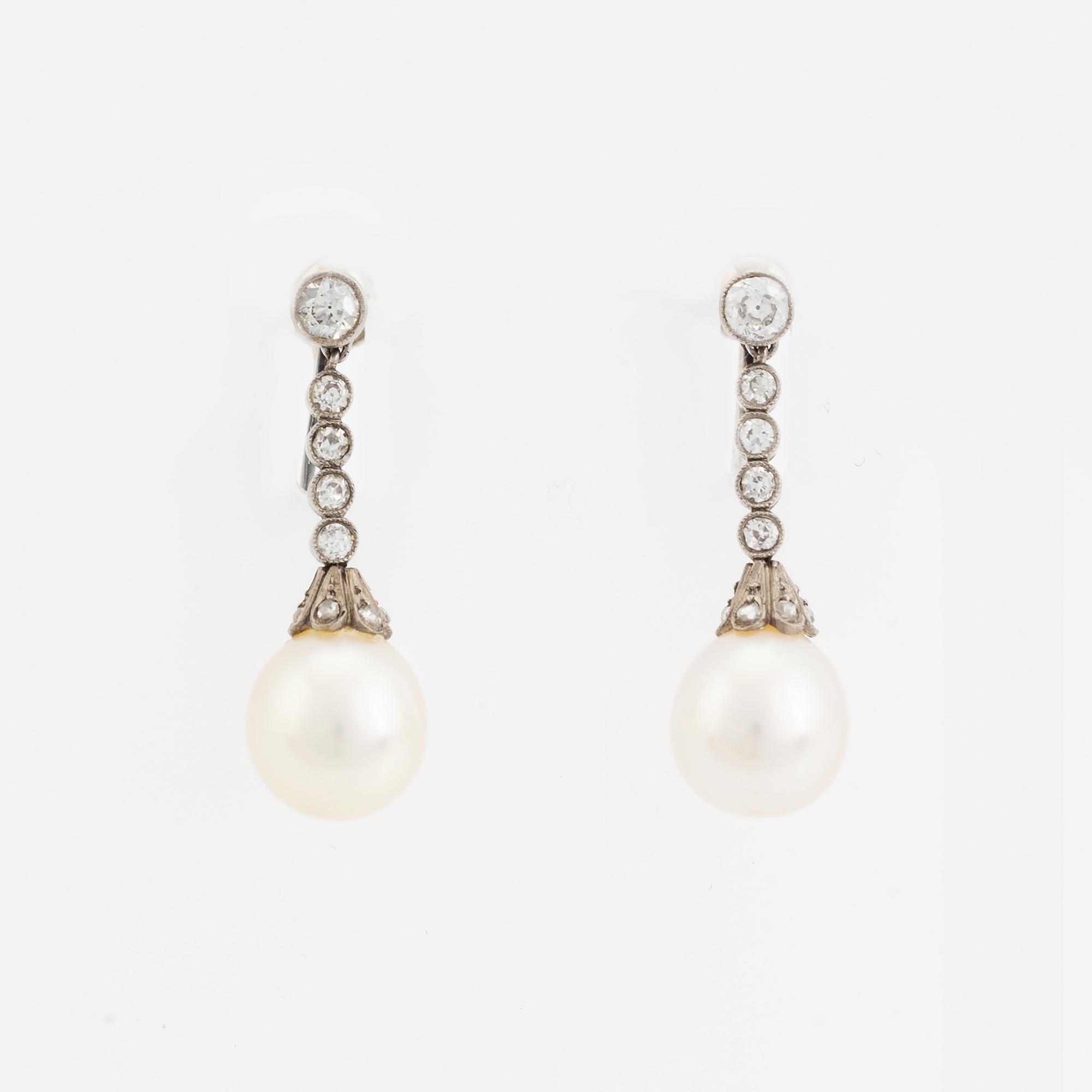 Old cut diamond and pearl earrings.