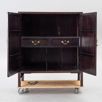 A hardwood cabinet, China, 20th century.