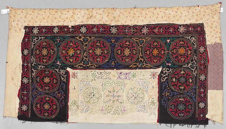 A Suzani textile, ca 247 x 128 cm.