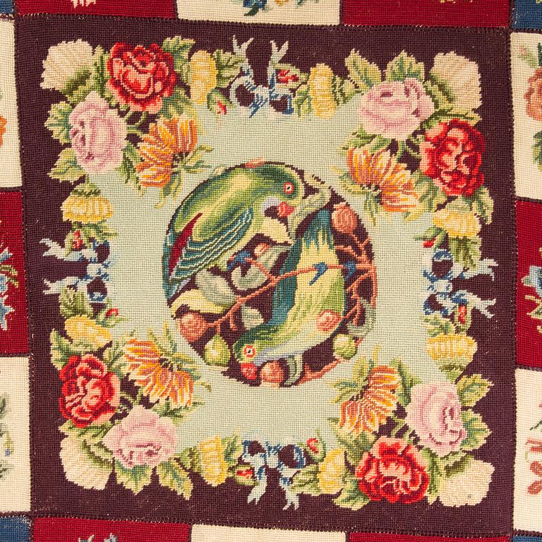 An embroided carpet, 1850-1900. Circa 195 x 130 cm.