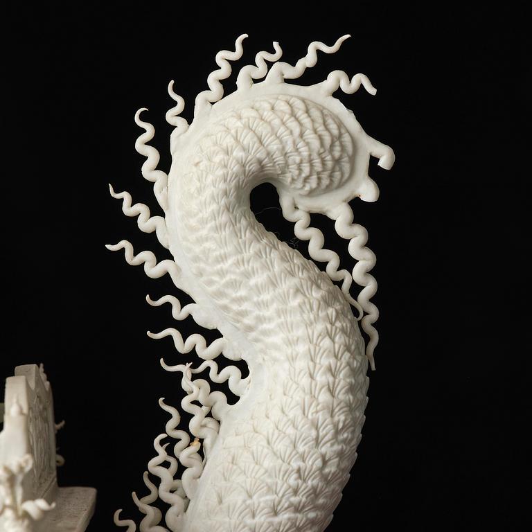 A white biscuit Dragon Boat, Qing dynasty, 19th Century.