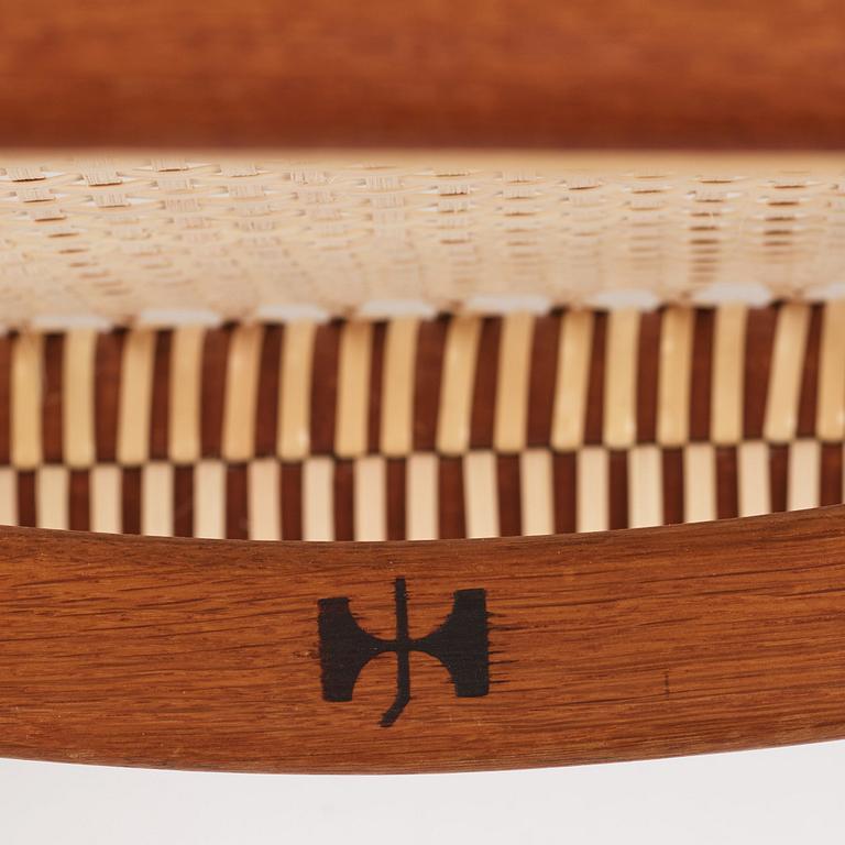 Hans J. Wegner, a pair of teak and rattan 'The Chair', JH-503, Johannes Hansen, Denmark 1950s.