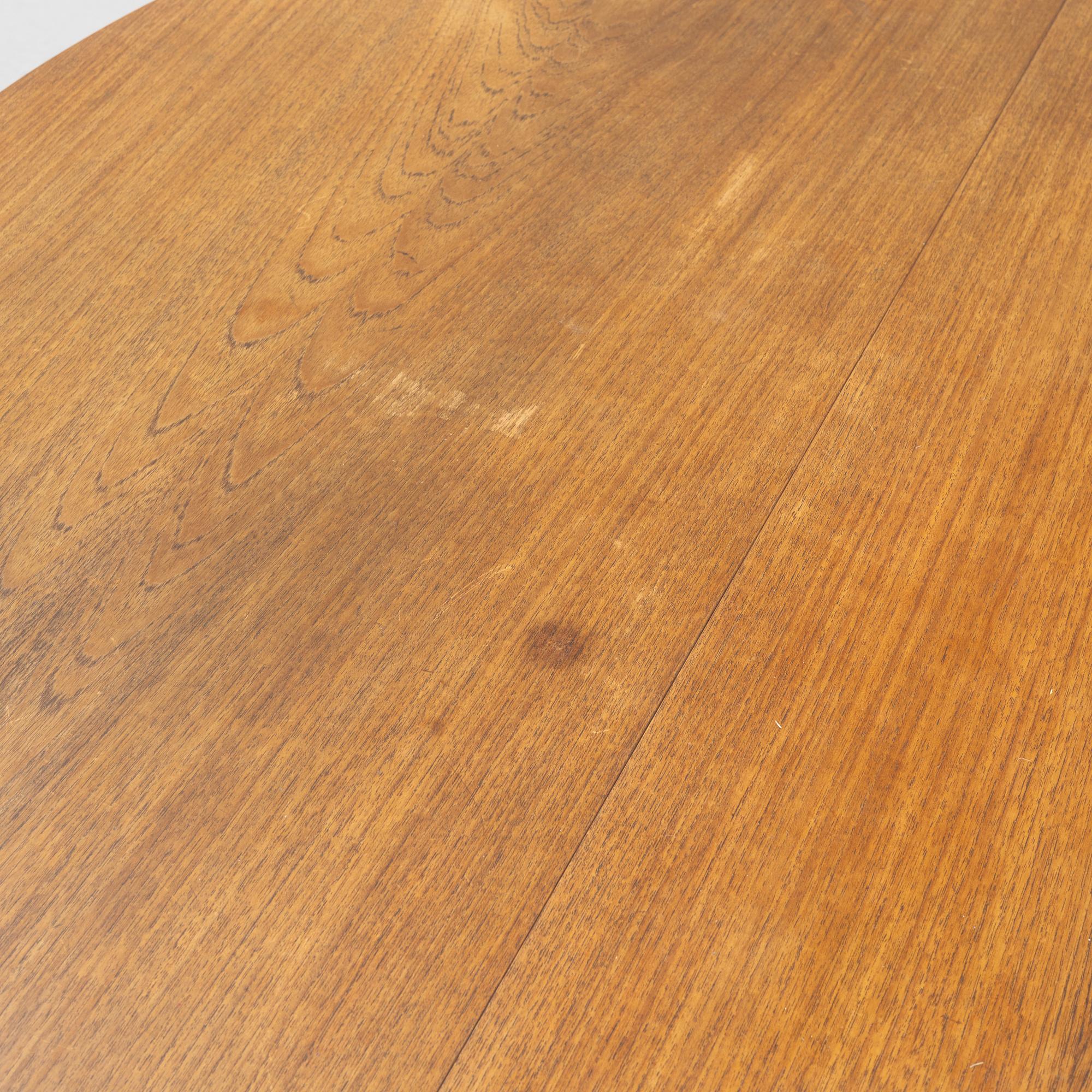 PEter Hvidt & Orla Mølgaard Nielsen, a teak dining table, France & Son, Denmark, mid 20th century.