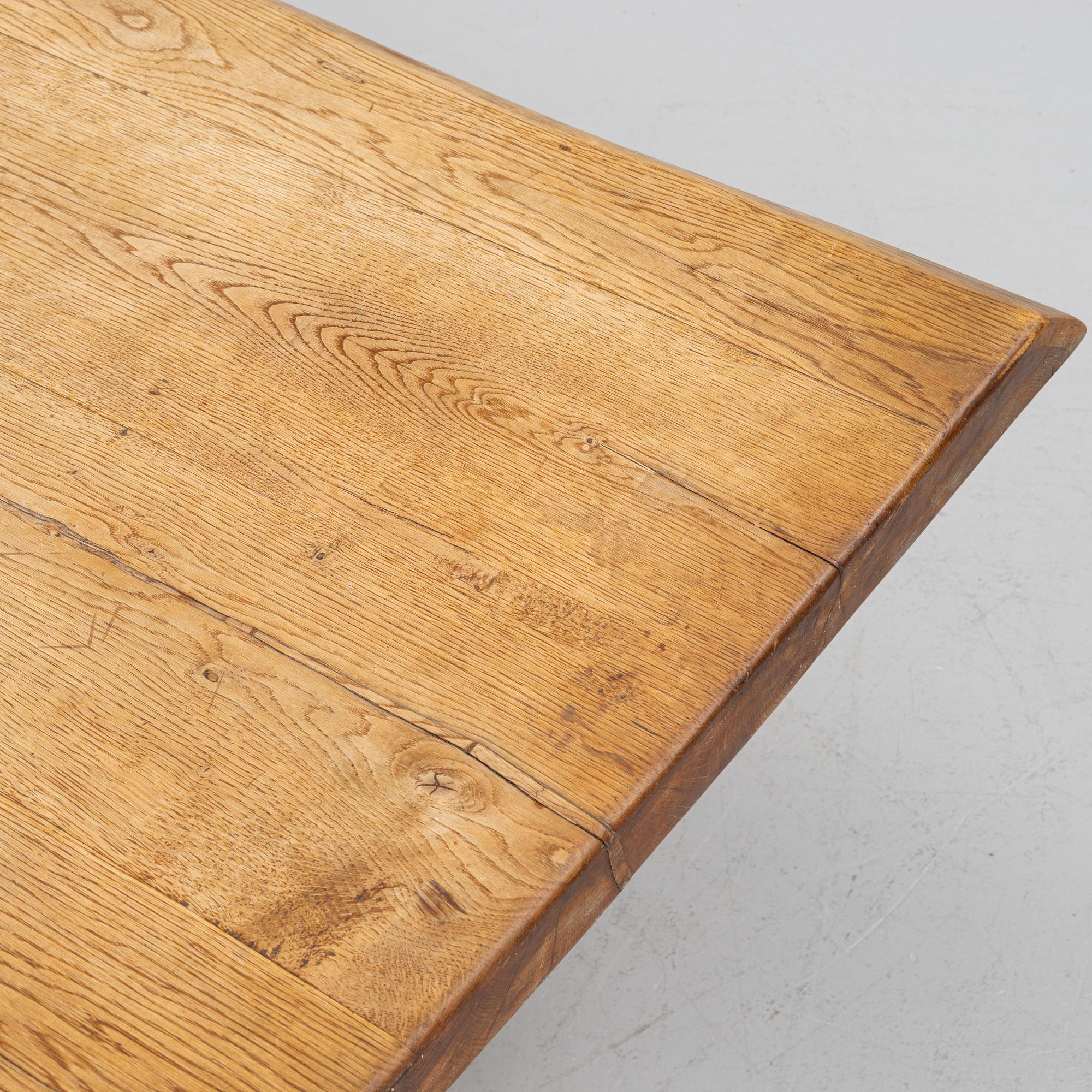 An oak table, first half of the 20th century.