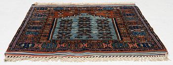 A semi-antique Anatolian rug, c. 127 x 117 cm.