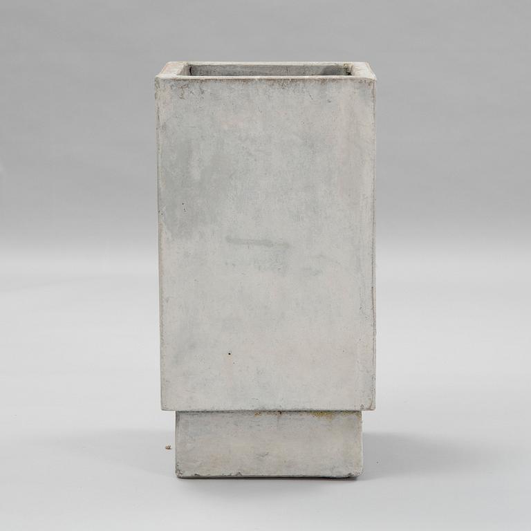 A contemporary concrete flowerpot.