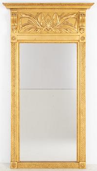 An Empire mirror, first half of the 19th century.