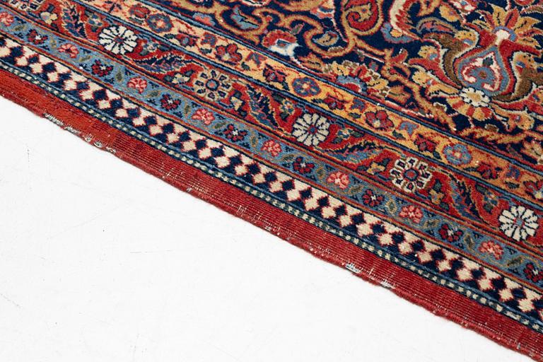An antique Kashan Dabir carpet, c. 404 x 312 cm.