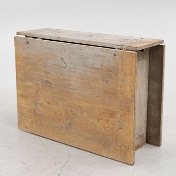 A 19th century painted gate leg table.