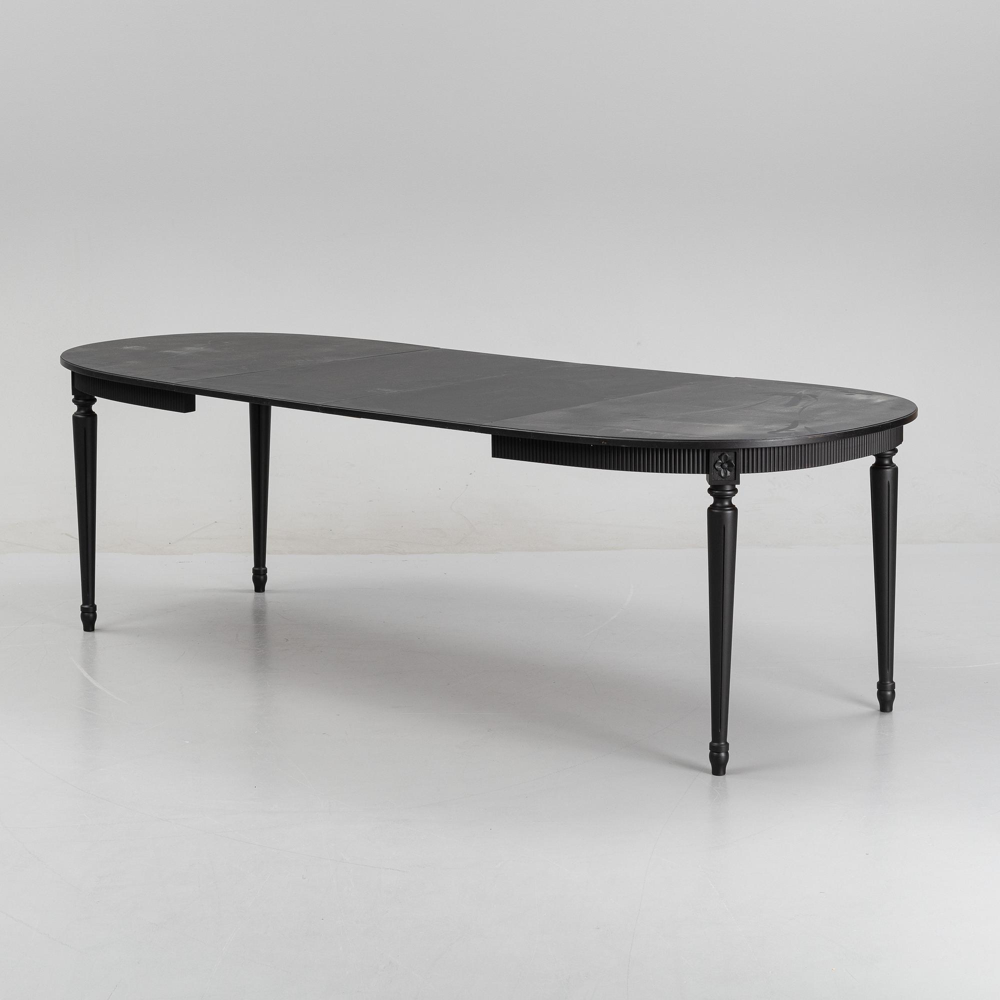 A Gustavians style dining table, second half of the 20th Century.