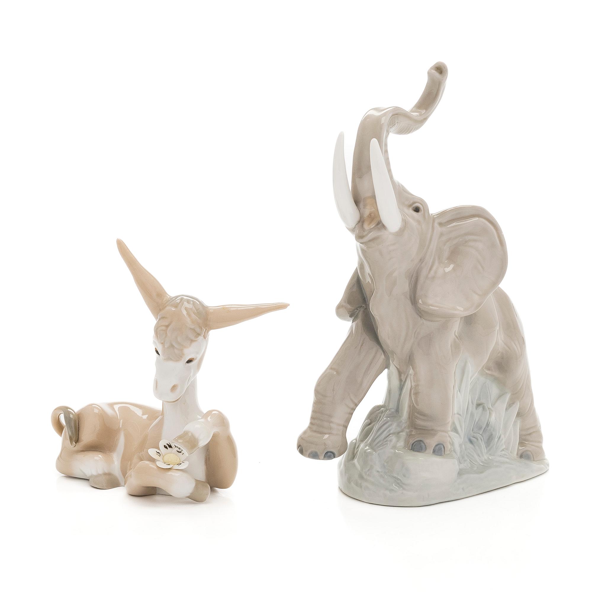 Lladró, two porcelain figurines, Donkey in Love and Trumpeting Elephant.
