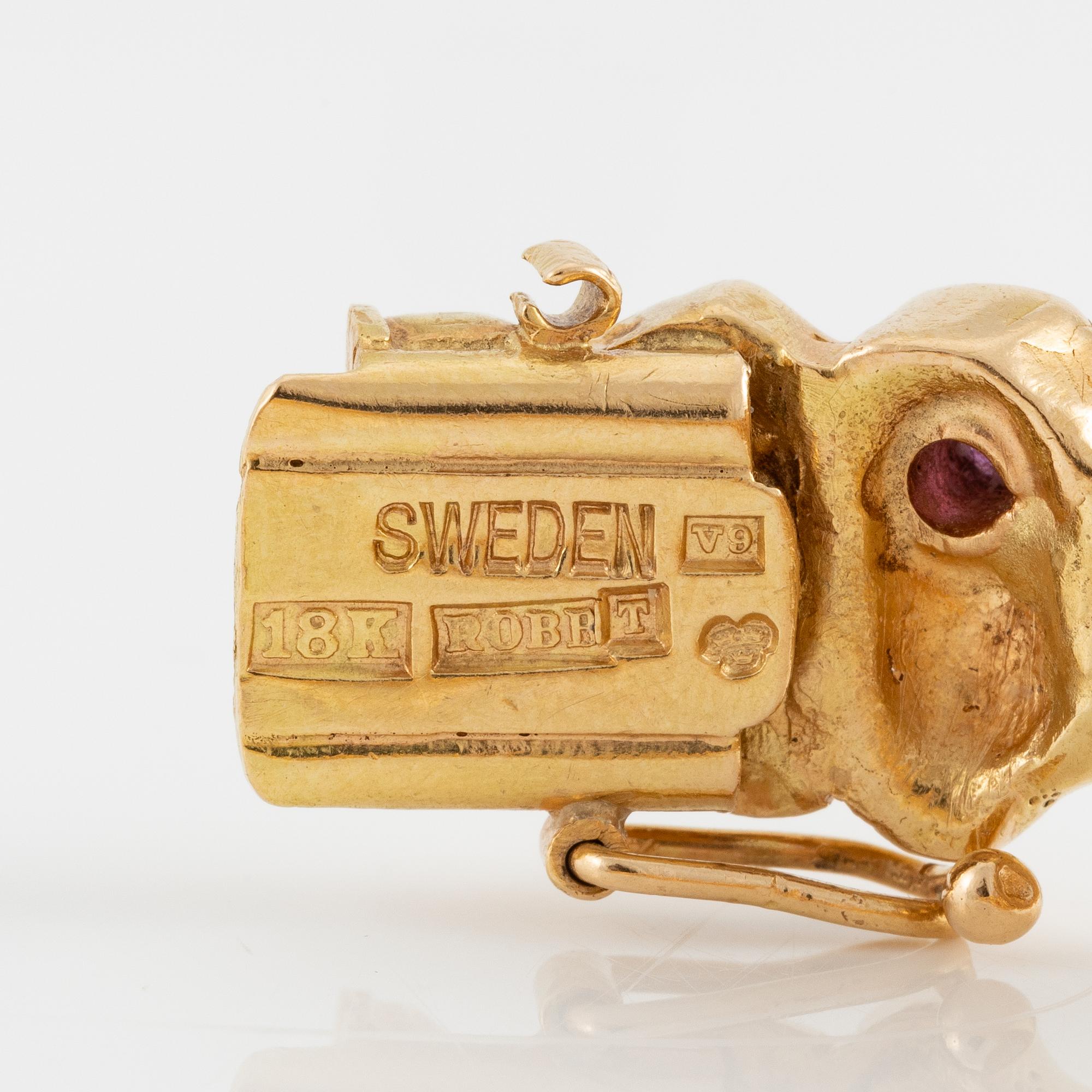 Bracelet, Robbert, 18K gold with red stones. Trosa 1971.