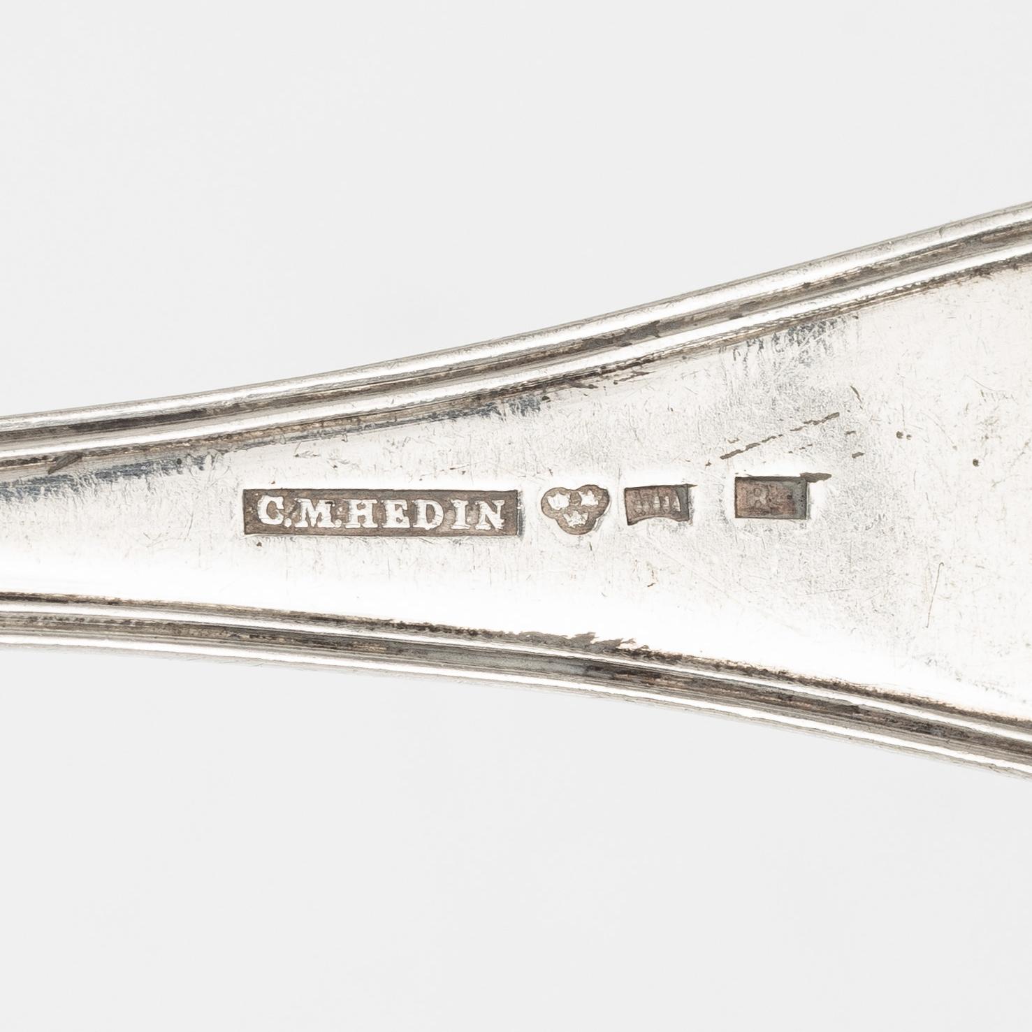 Skedar, 12 st, silver, modell Gammal fransk, Sverige, bl a med stämplar S Pettersson, Linköping 1862.