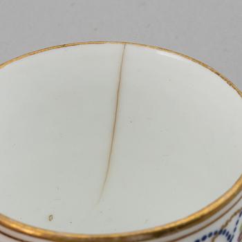 A tete a tete service, Empire, 19th Century. (5 pieces).