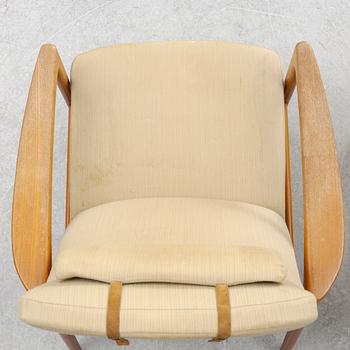 Folke Ohlson, two 'Siesta' armchairs, DUX, 1950s/60s.