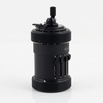 A Curta Type I mechanical calculator.