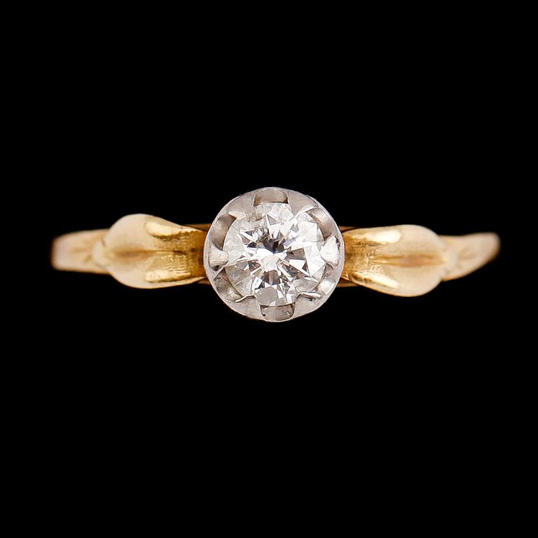 RING, 18 k guld, med briljantslipad diamant ca 0.25 ct. Vikt ca 2 gram.