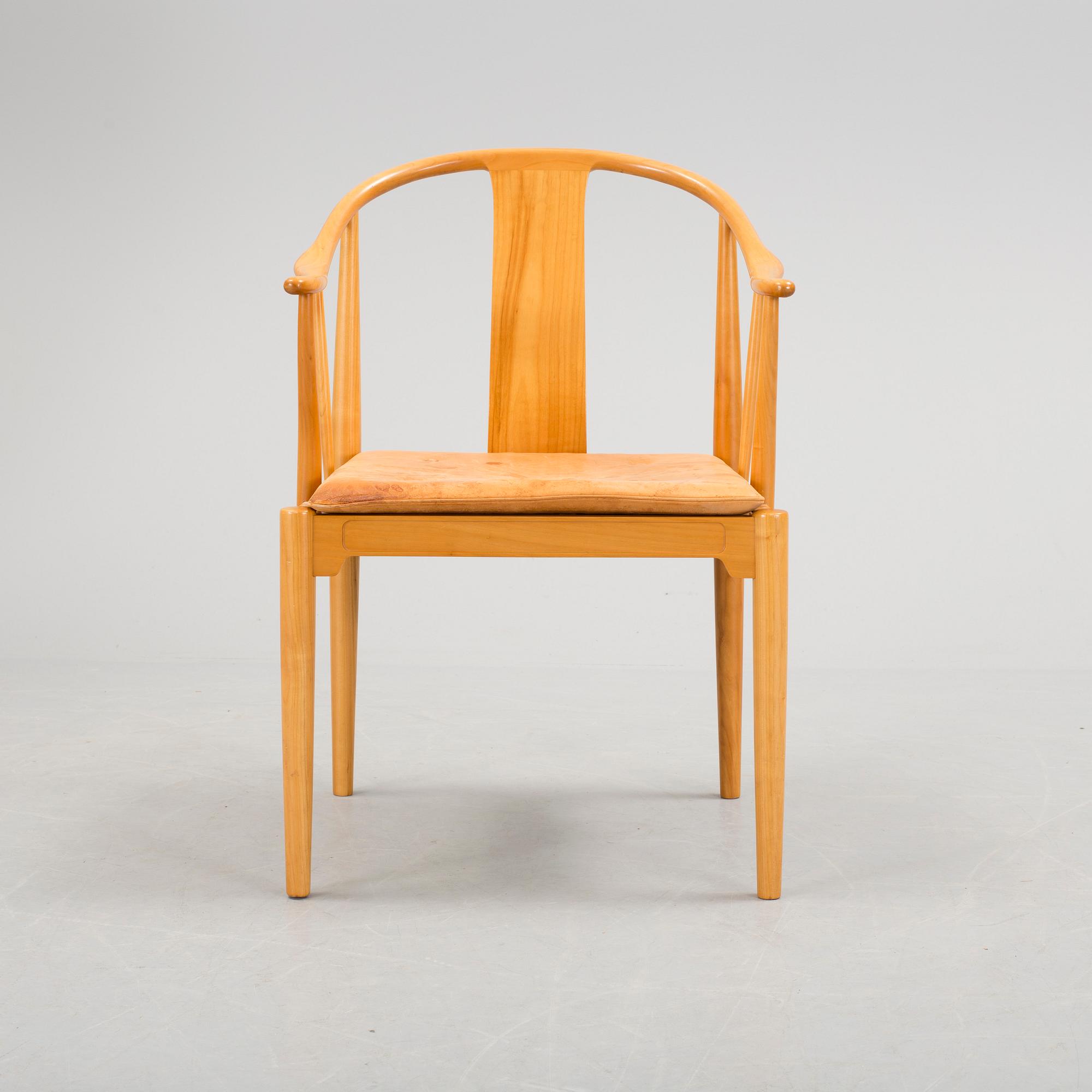 A Hans J Wegner 'Kinastolen' armchair, Fritz Hansen, Denmark 1971.