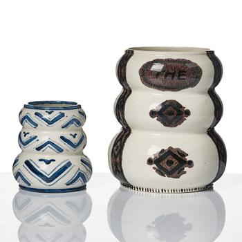 Wilhelm Kåge, a jar with cover, and four vases, creamware and porcelain, Gustavsberg, Sweden, 1917-1920.