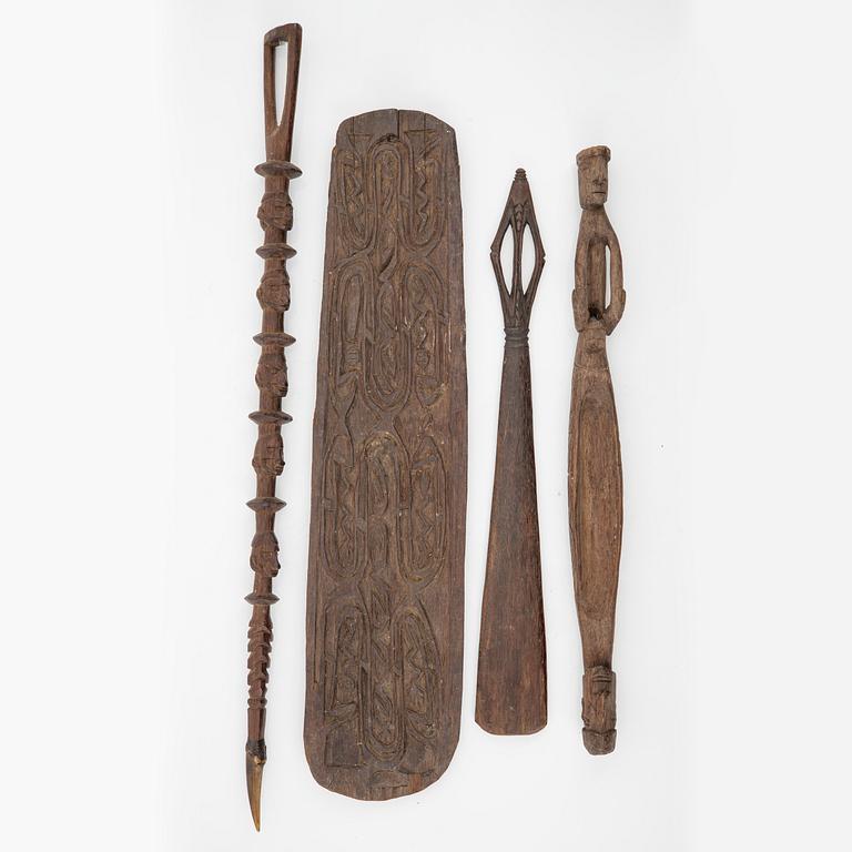 A group of four Asmat wood carvings, Indonesia, Jakarta, 20th Century.