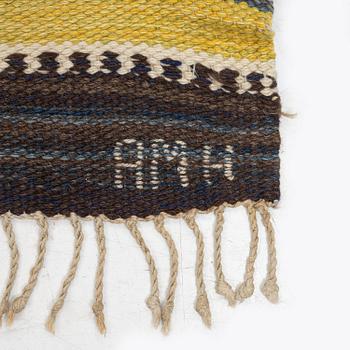 Anna Maria Hoke, a carpet, tapestry weave, c. 267 x 160 cm, signed GH AMH.