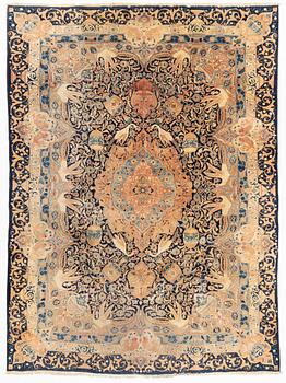 A Kashmar carpet, approximately 345 x 252 cm.