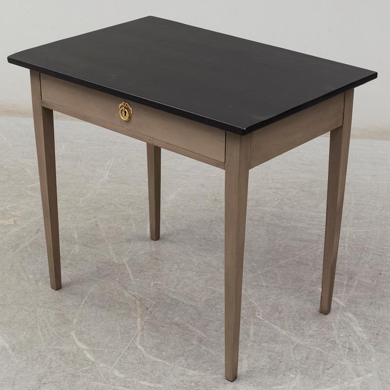 A late 19th or early 20th century writing desk.
