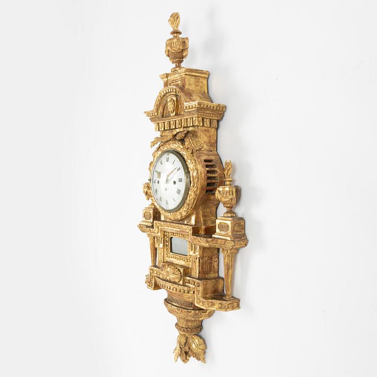 A presumably French Louis XVI giltwood wall clock, late 18th century.