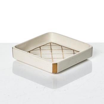 Wilhelm Kåge, 15 pieces of "Carrara" and "Gold Carrara" stoneware dishes, Gustavsberg, Sweden, 1930s/40s.