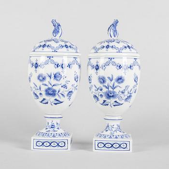 A pair of 'Blue Fluted Plain' porcelain urns with covers, Royal Copenhagen, model 286, 1898-1923.