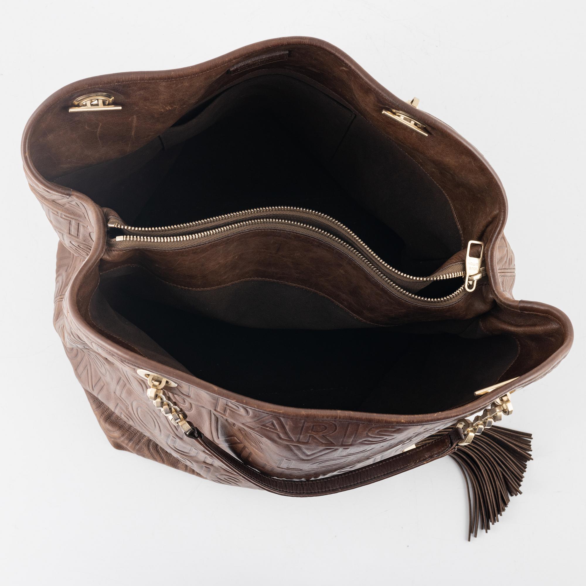 Louis Vuitton, a ' Paris Souple Whisper' embossed leather, 2008.