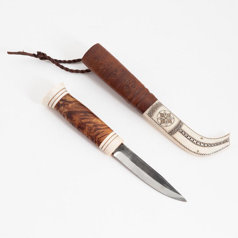 Jon Tomas Utsi, a reindeer horn knife, signed Jon T Utsi.