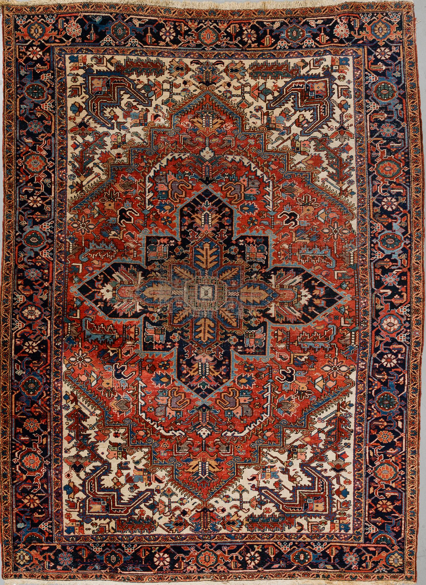 A CARPET, a semi-antique Heriz, ca 356,5-358,5 x 264 cm.