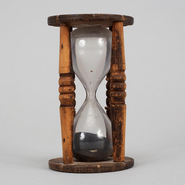 An hourglass, wooden frame, 18th/19th century.